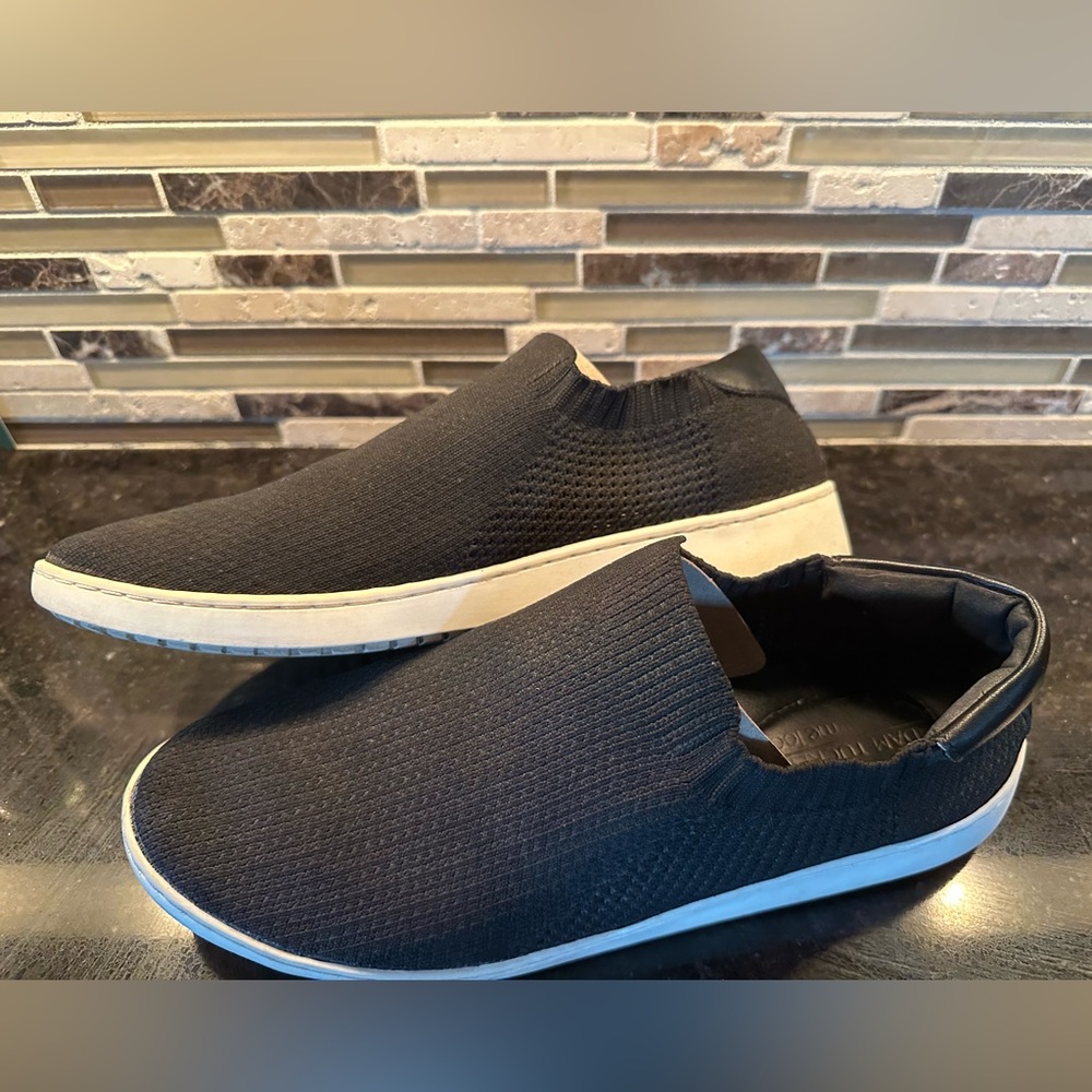 Adam Tucker slip in black shoes